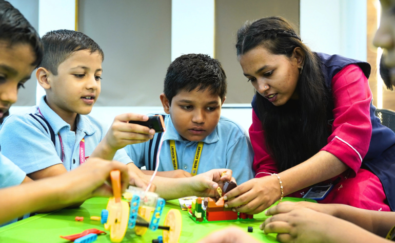 Students at Royal Academy School engaged in hands-on learning under the best ICSE curriculum school