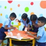 Students at Royal Academy School engaged in hands-on learning under the ICSE curriculum