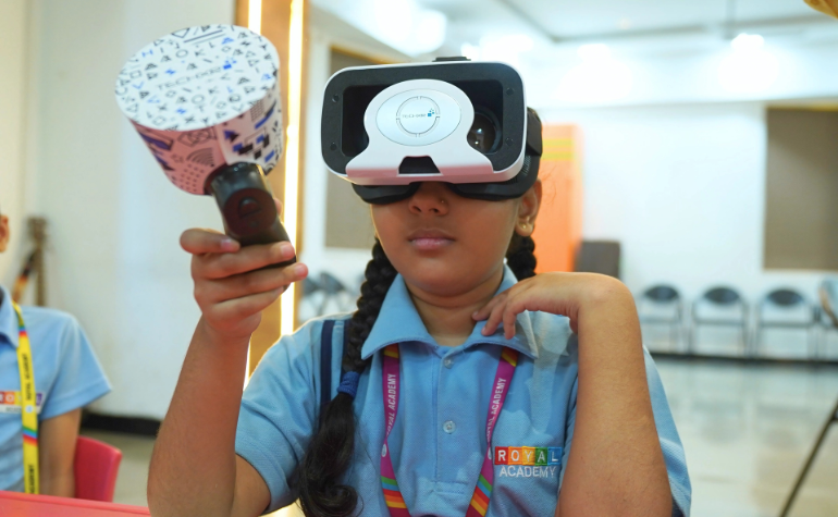 Royal Academy Primary School students engaged in interactive learning